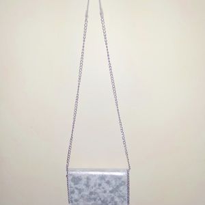 Chelsea 28 Silver crossbody/clutch.